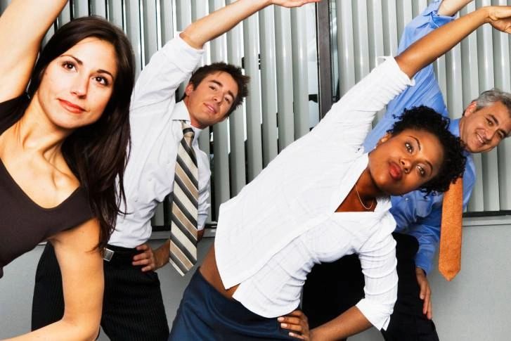 Diverse office workers team energetic poses